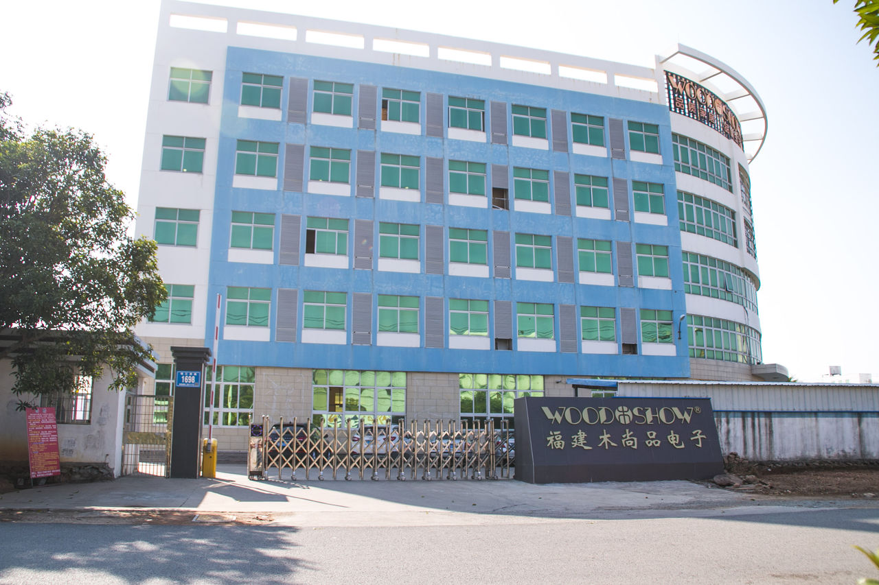 WOODSHOW factory gate and company sign in Putian